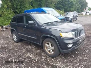 ✅ 2013 Jeep Grand Cherokee Laredo • VIN: 1C4RJFAG3DC542104 • Lot: 43035518. Listed on IAAI with 132,098 mi. Free auction sales archive from the USA and detailed vehicle history report at DreamBid. Image 1.