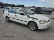 ✅ 1997 Honda Civic LX • VIN: 2HGEJ6679VH509356 • Lot: 90114765. Listed on Copart with 215,435 mi. Free auction sales archive from the USA and detailed vehicle history report at DreamBid. Image 4.