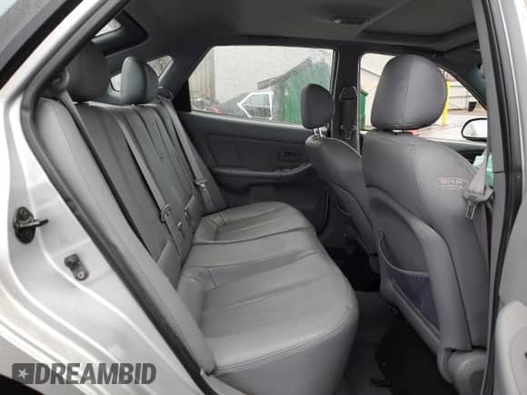 2005 Hyundai Elantra GLS z VIN KMHDN56D85U144983, wystawiony jako Copart lot #81267754 z przebiegiem 163 920 mil mil oraz Szkoda całkowita • Salvage title. Historia ofert i sprzedaży dostępna na DreamBid. Obrazek 10.