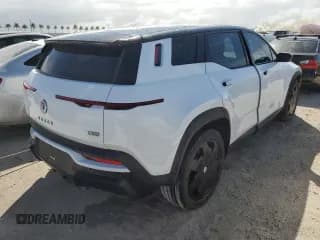 ✅ 2023 Fisker Ocean One • VIN: VCF1ZBU2XPG004379 • Lot: 76259084. Listed on Copart with 7,270 mi. Free auction sales archive from the USA and detailed vehicle history report at DreamBid. Image 3.