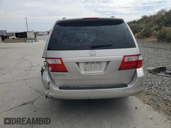 ✅ 2006 Honda Odyssey EX-L • VIN: 5FNRL38656B410666 • Лот: 80554015. Опубликован ранее на Copart с пробегом 243 001 миль. Бесплатный доступ к архиву аукционных продаж из США и подробный отчёт об истории автомобиля на DreamBid. Изображение 6.