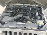 ✅ 2007 Jeep Wrangler X • VIN: 1J4GA39137L140393 • Lot: 68138715. Wystawiony na Copart z przebiegiem 187 621 mil. Bezpłatny archiwum sprzedaży aukcyjnych z USA i szczegółowy raport historii pojazdu na DreamBid. Zdjęcie 11.