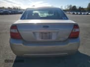 ✅ 2005 Ford Five Hundred SE • VIN: 1FAFP23195G113701 • Lot: 90420375. Wystawiony na Copart z przebiegiem 140 281 mil. Bezpłatny archiwum sprzedaży aukcyjnych z USA i szczegółowy raport historii pojazdu na DreamBid. Zdjęcie 6.