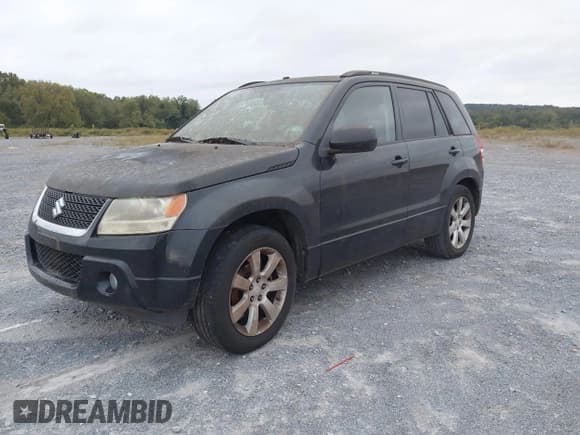 ✅ 2012 Suzuki Grand Vitara Limited • VIN: JS3TE0D72C4100220 • Lot: 43399361. Listed on IAAI with 196,385 mi. Free auction sales archive from the USA and detailed vehicle history report at DreamBid. Image 2.