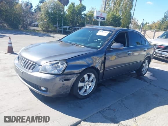 ✅ 2007 Kia Optima LX • VIN: KNAGE124675117422 • Lot: 43561900. Wystawiony na IAAI z przebiegiem 185 594 mil. Bezpłatny archiwum sprzedaży aukcyjnych z USA i szczegółowy raport historii pojazdu na DreamBid. Zdjęcie 2.