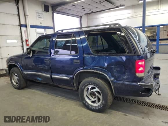 2000 Chevrolet Blazer LT with VIN 1GNDT13W6Y2372092, listed as a Copart auction lot 85784644 with 128,379 mi miles and Salvage title. Bid and sale history available at DreamBid. Image 2.