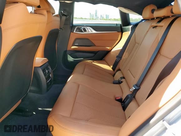 ✅ 2025 BMW i4 eDrive40 • VIN: WBY23HD04SFU49785 • Lot: 84401855. Listed on Copart with 12,977 mi. Free auction sales archive from the USA and detailed vehicle history report at DreamBid. Image 10.