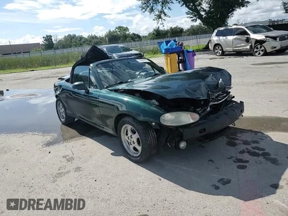 ✅ 2000 Mazda MX-5 Miata • VIN: JM1NB3537Y0148016 • Lot: 70867874. Wystawiony na Copart z przebiegiem 76 350 mil. Bezpłatny archiwum sprzedaży aukcyjnych z USA i szczegółowy raport historii pojazdu na DreamBid. Zdjęcie 11.