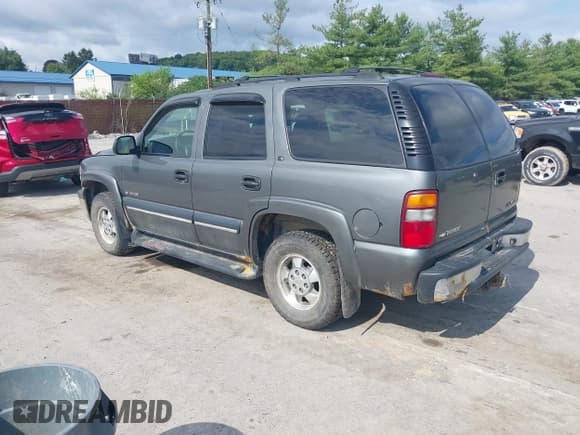 ✅ 2002 Chevrolet Tahoe LS • VIN: 1GNEK13Z82R260197 • Lot: 42761535. Listed on IAAI with 242,815 mi. Free auction sales archive from the USA and detailed vehicle history report at DreamBid. Image 3.
