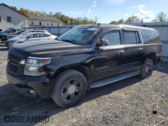 ✅ 2015 Chevrolet Suburban LTZ • VIN: 1GNSKKKC7FR125739 • Lot: 75875474. Wystawiony na Copart z przebiegiem 176 287 mil. Bezpłatny archiwum sprzedaży aukcyjnych z USA i szczegółowy raport historii pojazdu na DreamBid. Zdjęcie 1.