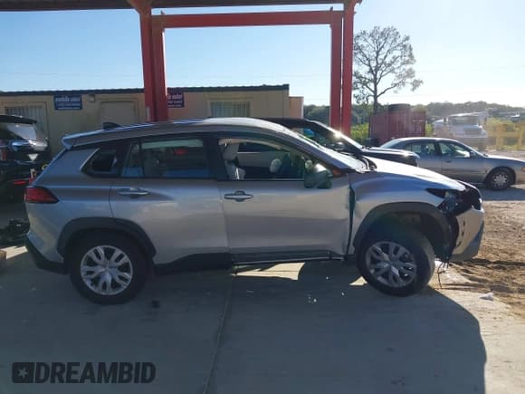 ✅ 2022 Toyota Corolla Cross L • VIN: 7MUAAAAG8NV008439 • Lot: 43446579. Listed on IAAI with Not provided. Free auction sales archive from the USA and detailed vehicle history report at DreamBid. Image 14.