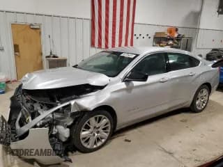✅ 2019 Chevrolet Impala LS • VIN: 2G11X5SAXK9141677 • Лот: 86706424. Опубликован ранее на Copart с пробегом 69 548 миль. Бесплатный доступ к архиву аукционных продаж из США и подробный отчёт об истории автомобиля на DreamBid. Изображение 1.