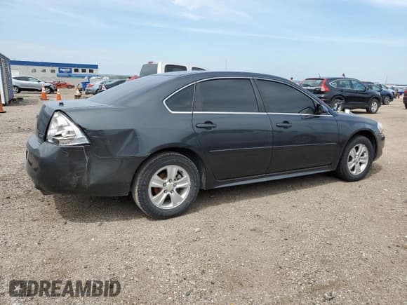 ✅ 2014 Chevrolet Impala LS • VIN: 2G1WA5E37E1173560 • Лот: 68598944. Опубликован ранее на Copart с пробегом 118 994 миль. Бесплатный доступ к архиву аукционных продаж из США и подробный отчёт об истории автомобиля на DreamBid. Изображение 3.