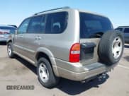 ✅ 2003 Suzuki XL7 Touring • VIN: JS3TX92V534103046 • Lot: 41978971. Listed on IAAI with 185,038 mi. Free auction sales archive from the USA and detailed vehicle history report at DreamBid. Image 3.