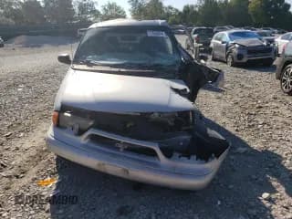 ✅ 1998 Ford Windstar LX • VIN: 2FMZA5145WBC60920 • Lot: 71553874. Wystawiony na Copart z przebiegiem 232 744 mil. Bezpłatny archiwum sprzedaży aukcyjnych z USA i szczegółowy raport historii pojazdu na DreamBid. Zdjęcie 5.