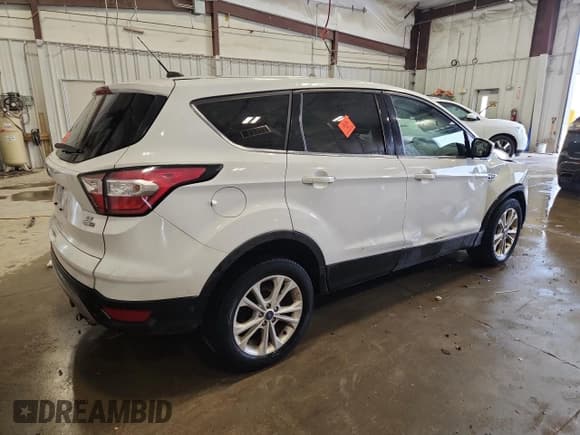 ✅ 2017 Ford Escape SE • VIN: 1FMCU9GD5HUC48386 • Лот: 90955865. Опубликован ранее на Copart с пробегом 212 196 миль. Бесплатный доступ к архиву аукционных продаж из США и подробный отчёт об истории автомобиля на DreamBid. Изображение 3.