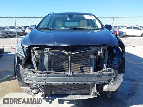 ✅ 2019 Cadillac XT5 Luxury FWD • VIN: 1GYKNCRS8KZ244889 • Lot: 43654340. Listed on IAAI with 94,684 mi. Free auction sales archive from the USA and detailed vehicle history report at DreamBid. Image 13.