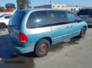 ✅ 1999 Dodge Caravan SE • VIN: 2B4GP45R3XR435259 • Lot: 43821383. Listed on IAAI with 112,156 mi. Free auction sales archive from the USA and detailed vehicle history report at DreamBid. Image 4.