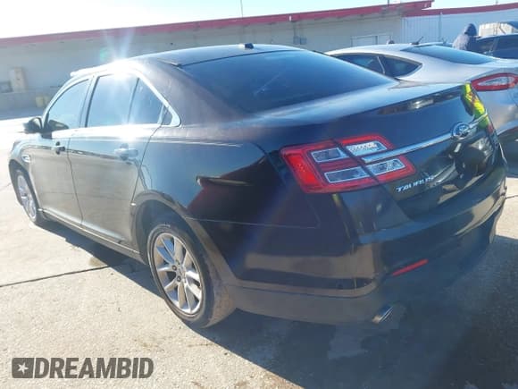 ✅ 2014 Ford Taurus SE • VIN: 1FAHP2D83EG149291 • Лот: 43800830. Опубликован ранее на IAAI с пробегом 127 711 миль. Бесплатный доступ к архиву аукционных продаж из США и подробный отчёт об истории автомобиля на DreamBid. Изображение 3.