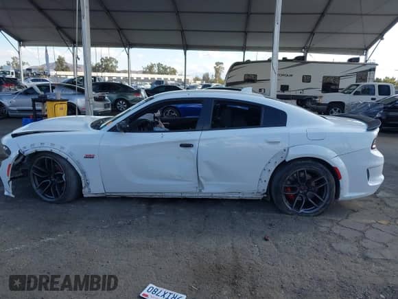 2020 Dodge Charger Scat Pack with VIN 2C3CDXGJ5LH160551, listed as a IAAI auction lot 43372982 with 45,141 mi miles and . Bid and sale history available at DreamBid. Image 15.