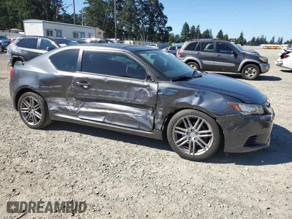 ✅ 2012 Scion tC • VIN: JTKJF5C76C3030740 • Лот: 68595775. Опубликован ранее на Copart с пробегом 95 744 миль. Бесплатный доступ к архиву аукционных продаж из США и подробный отчёт об истории автомобиля на DreamBid. Изображение 4.