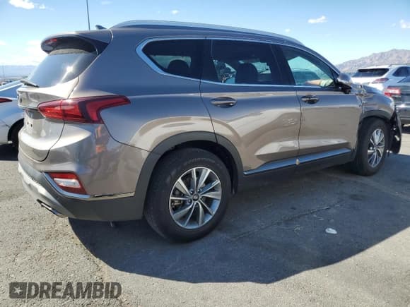 ✅ 2020 Hyundai Santa Fe Limited • VIN: 5NMS53AD1LH200256 • Лот: 85756545. Опубликован ранее на Copart с пробегом 79 203 миль. Бесплатный доступ к архиву аукционных продаж из США и подробный отчёт об истории автомобиля на DreamBid. Изображение 3.