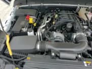 ✅ 2022 Jeep Wrangler Unlimited Sahara Altitude • VIN: 1C4HJXEG3NW148744 • Lot: 70289415. Listed on Copart with 21,630 mi. Free auction sales archive from the USA and detailed vehicle history report at DreamBid. Image 14.