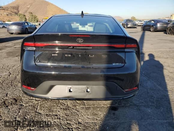 2025 Toyota Prius LE с VIN JTDACAAU8S3059589, выставлен на аукционе Copart как лот 72100945 с пробегом 14 715 миль миль и Списание • Salvage title. История ставок и продаж доступна на DreamBid. Изображение 6.