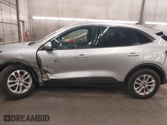 ✅ 2020 Ford Escape SE • VIN: 1FMCU9G63LUA56720 • Lot: 42199549. Listed on IAAI with 57,944 mi. Free auction sales archive from the USA and detailed vehicle history report at DreamBid. Image 15.