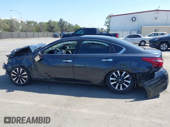✅ 2018 Nissan Altima SV • VIN: 1N4AL3AP7JC180902 • Лот: 43133703. Опубликован ранее на IAAI с пробегом Не указан. Бесплатный доступ к архиву аукционных продаж из США и подробный отчёт об истории автомобиля на DreamBid. Изображение 15.
