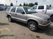 2000 Chevrolet Blazer LT with VIN 1GNDT13W5Y2220272, listed as a Copart auction lot 71961315 with 199,975 mi miles and Salvage title. Bid and sale history available at DreamBid. Image 4.