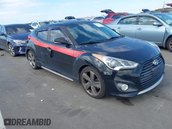 ✅ 2014 Hyundai Veloster Turbo • VIN: KMHTC6AE3EU183231 • Lot: 43641241. Listed on IAAI with 154,712 mi. Free auction sales archive from the USA and detailed vehicle history report at DreamBid. Image 1.