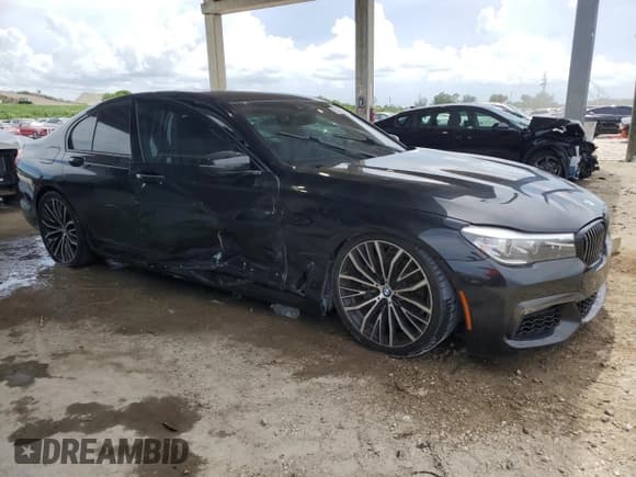 ✅ 2019 BMW 7 Series 740i • VIN: WBA7E2C52KB216875 • Lot: 67796945. Listed on Copart with 92,363 mi. Free auction sales archive from the USA and detailed vehicle history report at DreamBid. Image 4.