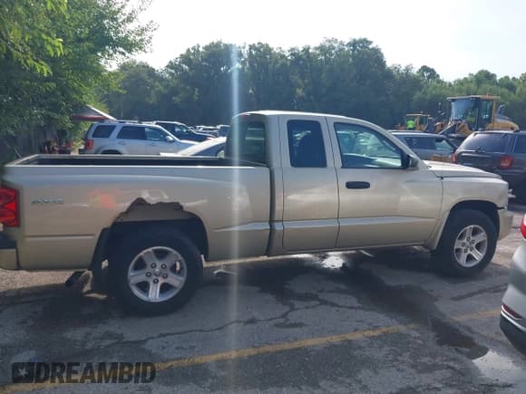 ✅ 2011 Ram Dakota Big Horn • VIN: 1D7RW3BKXBS569148 • Lot: 43034444. Listed on IAAI with 94,027 mi. Free auction sales archive from the USA and detailed vehicle history report at DreamBid. Image 13.