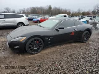 ✅ 2009 Maserati GranTurismo • VIN: ZAMGJ45A990044267 • Лот: 84144674. Опубликован ранее на Copart с пробегом 63 178 миль. Бесплатный доступ к архиву аукционных продаж из США и подробный отчёт об истории автомобиля на DreamBid. Изображение 1.