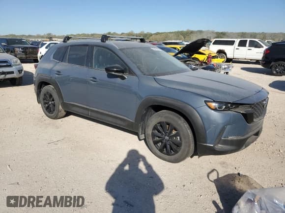 ✅ 2024 Mazda CX-50 S Preferred • VIN: 7MMVABBM3RN243266 • Лот: 86439985. Опубликован ранее на Copart с пробегом 27 899 миль. Бесплатный доступ к архиву аукционных продаж из США и подробный отчёт об истории автомобиля на DreamBid. Изображение 4.