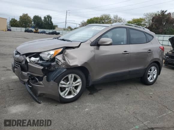 ✅ 2011 Hyundai Tucson GLS • VIN: KM8JU3AC7BU171936 • Лот: 82522355. Опубликован ранее на Copart с пробегом 327 309 миль. Бесплатный доступ к архиву аукционных продаж из США и подробный отчёт об истории автомобиля на DreamBid. Изображение 1.