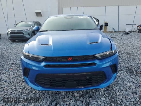 2024 Dodge Hornet GT z VIN ZACNDFAN5R3A31234, wystawiony jako Copart lot #57794435 z przebiegiem Nie podano mil oraz Czysty tytuł • Clean title. Historia ofert i sprzedaży dostępna na DreamBid. Obrazek 5.