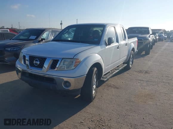 ✅ 2010 Nissan Frontier SE • VIN: 1N6AD0ER5AC402545 • Lot: 43305489. Listed on IAAI with 185,332 mi. Free auction sales archive from the USA and detailed vehicle history report at DreamBid. Image 2.