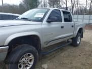 ✅ 2002 Dodge Dakota SLT • VIN: 1B7HG48N82S581583 • Lot: 41525790. Wystawiony na IAAI z przebiegiem 255 806 mil. Bezpłatny archiwum sprzedaży aukcyjnych z USA i szczegółowy raport historii pojazdu na DreamBid. Zdjęcie 17.