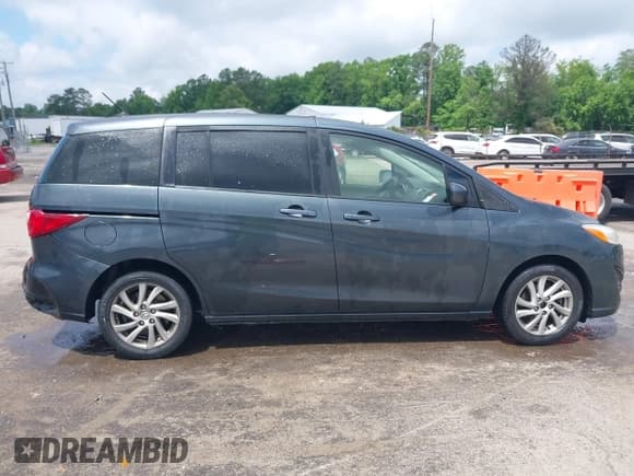 ✅ 2012 Mazda 5 Sport • VIN: JM1CW2BL6C0130500 • Lot: 42258823. Listed on IAAI with 140,243 mi. Free auction sales archive from the USA and detailed vehicle history report at DreamBid. Image 14.