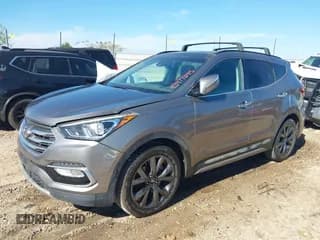 ✅ 2018 Hyundai Santa Fe Ultimate • VIN: 5XYZW4LA7JG570509 • Лот: 43477345. Опубликован ранее на IAAI с пробегом 102 481 миль. Бесплатный доступ к архиву аукционных продаж из США и подробный отчёт об истории автомобиля на DreamBid. Изображение 2.