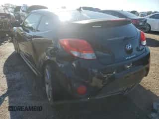 2013 Hyundai Veloster Turbo с VIN KMHTC6AE2DU138327, выставлен на аукционе Copart как лот 72379734 с пробегом 116 629 миль миль и Списание • Salvage title. История ставок и продаж доступна на DreamBid. Изображение 2.