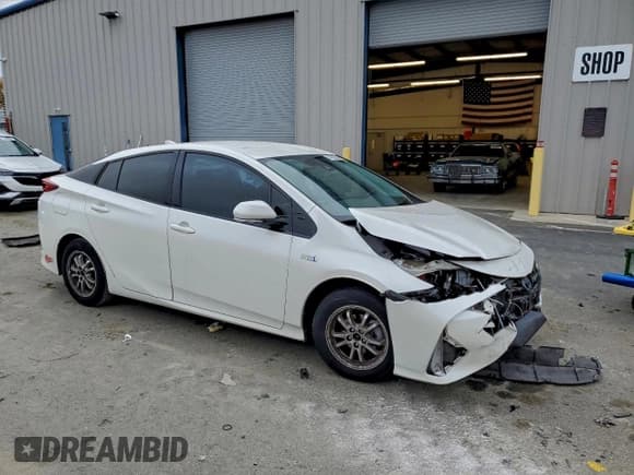 ✅ 2017 Toyota Prius Plus • VIN: JTDKARFP3H3036144 • Lot: 94397075. Listed on Copart with 57,322 mi. Free auction sales archive from the USA and detailed vehicle history report at DreamBid. Image 4.