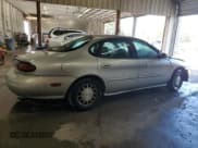 ✅ 1998 Ford Taurus SE Comfort • VIN: 1FAFP53S3WA211363 • Lot: 82145095. Listed on Copart with 222,022 mi. Free auction sales archive from the USA and detailed vehicle history report at DreamBid. Image 3.