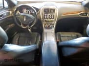 ✅ 2017 Lincoln MKZ Reserve • VIN: 3LN6L5E96HR605296 • Lot: 91032705. Wystawiony na Copart z przebiegiem 143 023 mil. Bezpłatny archiwum sprzedaży aukcyjnych z USA i szczegółowy raport historii pojazdu na DreamBid. Zdjęcie 8.