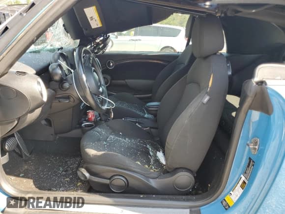 ✅ 2014 MINI Convertible S • VIN: WMWZP3C51ET707154 • Lot: 75063964. Wystawiony na Copart z przebiegiem Nie podano. Bezpłatny archiwum sprzedaży aukcyjnych z USA i szczegółowy raport historii pojazdu na DreamBid. Zdjęcie 7.