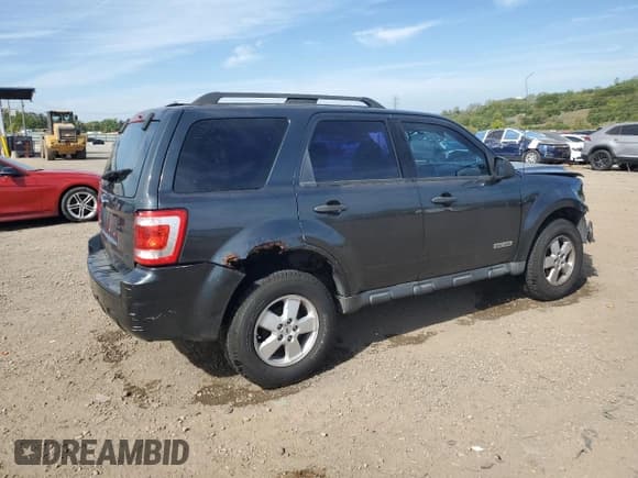 ✅ 2008 Ford Escape XLS • VIN: 1FMCU02Z78KA56333 • Lot: 84703615. Listed on Copart with 209,749 mi. Free auction sales archive from the USA and detailed vehicle history report at DreamBid. Image 3.