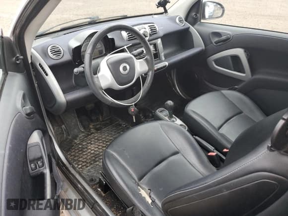 ✅ 2012 Smart fortwo Pure • VIN: WMEEJ3BA5CK573299 • Lot: 86857175. Listed on Copart with 71,721 mi. Free auction sales archive from the USA and detailed vehicle history report at DreamBid. Image 8.