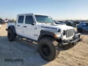 ✅ 2022 Jeep Gladiator Rubicon • VIN: 1C6JJTBG6NL142413 • Lot: 86098244. Listed on Copart with 20,750 mi. Free auction sales archive from the USA and detailed vehicle history report at DreamBid. Image 4.